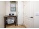 Laundry area with a folding table and storage cabinet at 41906 W Solitare Dr, Maricopa, AZ 85138