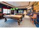 Community billiards room with two billiard tables at 41906 W Solitare Dr, Maricopa, AZ 85138