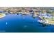 Community lake with clubhouse and pool views at 41906 W Solitare Dr, Maricopa, AZ 85138