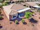 Single-story home with covered patio and desert landscaping at 41906 W Solitare Dr, Maricopa, AZ 85138