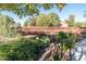 Attractive footbridge over a waterway at 41906 W Solitare Dr, Maricopa, AZ 85138