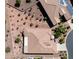 Top-down view of house showing roofline and backyard patio at 41906 W Solitare Dr, Maricopa, AZ 85138