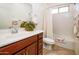 Clean bathroom with a bathtub, toilet and vanity at 41906 W Solitare Dr, Maricopa, AZ 85138