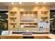 Community room showcasing model ships and historical plaques at 41906 W Solitare Dr, Maricopa, AZ 85138