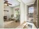 Welcoming entryway with decorative door and comfortable seating area at 41906 W Solitare Dr, Maricopa, AZ 85138