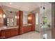 Spa-like bathroom with double sinks and a large soaking tub at 6301 N 51St Pl, Paradise Valley, AZ 85253