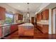Large kitchen with granite countertops and stainless steel appliances at 6301 N 51St Pl, Paradise Valley, AZ 85253