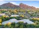 Aerial view showcasing a luxury home and surrounding mountain views at 6301 N 51St Pl, Paradise Valley, AZ 85253