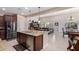 Spacious kitchen with island, stainless steel appliances, and open layout at 42915 W Kingfisher Dr, Maricopa, AZ 85138