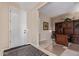 Spacious home office with built-in cabinetry and large desk at 42915 W Kingfisher Dr, Maricopa, AZ 85138