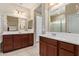 Elegant bathroom with double sinks and a large mirror at 42915 W Kingfisher Dr, Maricopa, AZ 85138