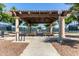 Relaxing covered pavilion with picnic tables at 42915 W Kingfisher Dr, Maricopa, AZ 85138