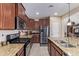 Spacious kitchen with stainless steel appliances and granite countertops at 42915 W Kingfisher Dr, Maricopa, AZ 85138