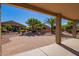 Backyard patio with brick pavers and desert landscaping at 42915 W Kingfisher Dr, Maricopa, AZ 85138