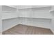 Large walk-in closet with ample shelving and hanging space at 2935 W Joy Ranch Rd, Phoenix, AZ 85086