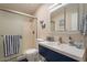 Updated bathroom with a vanity and shower at 14300 W Bell Rd # 222, Surprise, AZ 85374