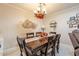 Charming dining area with a wood table and seating for six at 14300 W Bell Rd # 222, Surprise, AZ 85374