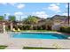 Inviting community pool with mountain views and lounge chairs at 1213 E Lawrence Ln, Phoenix, AZ 85020