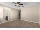 Bedroom with carpeted floors and ceiling fan at 1412 W Chillingham Rd, San Tan Valley, AZ 85143