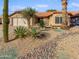 Single story home with desert landscaping at 1232 E Grovers Ave, Phoenix, AZ 85022