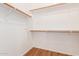 Large walk-in closet with double hanging rods at 42424 N Gavilan Peak Pkwy # 50104, Anthem, AZ 85086