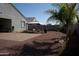 Backyard with patio, gazebo, and gravel at 30893 W Pinchot W Ct, Buckeye, AZ 85396