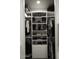 Bright walk-in closet, custom built-in shelving and rods at 30893 W Pinchot W Ct, Buckeye, AZ 85396