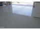 Clean epoxy coated garage floor with storage at 30893 W Pinchot W Ct, Buckeye, AZ 85396