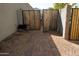 Wooden gate providing access to the backyard at 30893 W Pinchot W Ct, Buckeye, AZ 85396