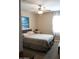 Primary bedroom with queen bed and ceiling fan at 30893 W Pinchot W Ct, Buckeye, AZ 85396