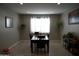 Bright dining area with a large table and plenty of natural light at 30893 W Pinchot W Ct, Buckeye, AZ 85396