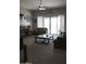 Spacious living room with large windows and comfortable seating at 30893 W Pinchot W Ct, Buckeye, AZ 85396