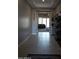 Tiled entryway with views of living room at 30893 W Pinchot W Ct, Buckeye, AZ 85396