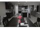Kitchen features a breakfast bar and stainless steel appliances at 30893 W Pinchot W Ct, Buckeye, AZ 85396