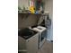 Laundry room with washer, dryer, and ample storage at 30893 W Pinchot W Ct, Buckeye, AZ 85396