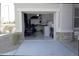 Garage with storage, shelving and an ATV at 30893 W Pinchot W Ct, Buckeye, AZ 85396