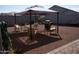 Relaxing backyard patio with gazebo, seating, and grill at 30893 W Pinchot W Ct, Buckeye, AZ 85396