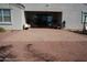 Large covered patio with brick flooring and seating at 30893 W Pinchot W Ct, Buckeye, AZ 85396