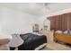 Bedroom with double bed, dresser, and birdcage at 2029 S Las Palmas --, Mesa, AZ 85202