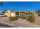 Front view of two-car garage and landscaping at 2029 S Las Palmas --, Mesa, AZ 85202