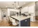 Spacious kitchen with large island and white shaker cabinets at 3410 N 45Th Pl, Phoenix, AZ 85018