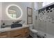 Stylish bathroom with hexagon tile, floating vanity, and modern fixtures at 11250 W Prospector Dr, Queen Creek, AZ 85144