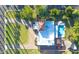 Aerial view of single-story home with pool and landscaped yard at 118 E Palm Ln, Phoenix, AZ 85004