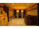 Impressive wine cellar with brick walls and extensive storage at 118 E Palm Ln, Phoenix, AZ 85004