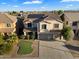 Aerial view of house with solar panels and landscaping at 15163 W Cameron Dr, Surprise, AZ 85379