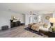 Main bedroom with a dresser and king-size bed at 15163 W Cameron Dr, Surprise, AZ 85379