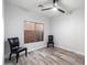Bright bedroom with two chairs and a window at 15163 W Cameron Dr, Surprise, AZ 85379