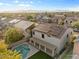 Aerial view showing house, pool and backyard at 15163 W Cameron Dr, Surprise, AZ 85379