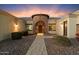 Elegant entryway with stone arch and pathway at 1356 E Loveland Ln, San Tan Valley, AZ 85140