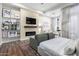 Main bedroom with fireplace and built-in shelving at 3534 N Boulder Canyon St, Mesa, AZ 85207